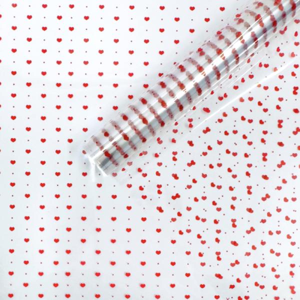 Пленка прозрачная Мелкие сердечки красные 70см*200гр ± 5%