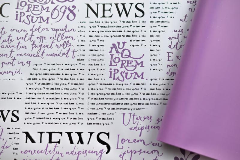 Пленка матовая двухст. с рисунком Газета цв.виолет 58см*12м±5% 50мкр