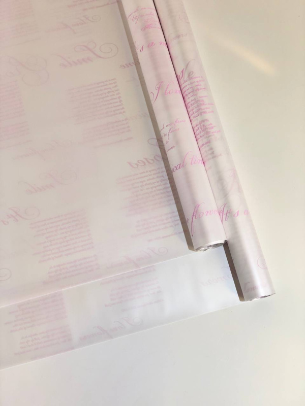 Матовая пленка двухсторонняя на втулке 50мкр Перламутр белый/Стихи розовый 60 см*10 ярд ± 5%