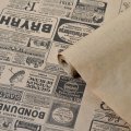 Крафт бумага Винтажная газета черная на коричневом фоне 720мм/60гр/10м± 5%