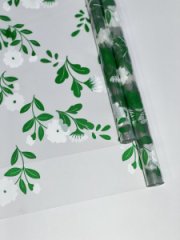 Пленка прозрачная двухцветная с рисунком Полевые цветы бело-салатовая 70см*10ярд ± 5%