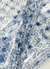 Пленка прозрачная двухцветная Новогодние марки синий/белый 70см*200гр ± 5%