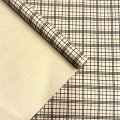 Крафт бумага Клетка черный/красный на коричневом 700мм/60гр/10м ± 5%