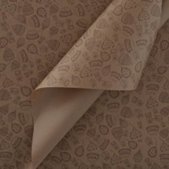 Крафт бумага Праздник коричневый на коричневом фоне 70см/60гр/10м± 5%
