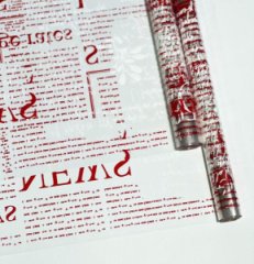 Пленка прозрачная двухцветная с рисунком Газета бело-красная 70см*10ярд ± 5%