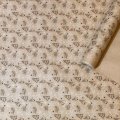 Упаковочная новогодняя бумага Елочки цв.черный/белый на коричневом 68см/60пл/10м
