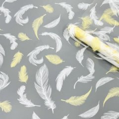 Пленка прозрачная двухцветная Перья белый/сливочно желтый 68см*200гр ± 5%