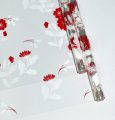 Пленка прозрачная двухцветная с рисунком Полевые цветы бело- красная 70см*10ярд ± 5%