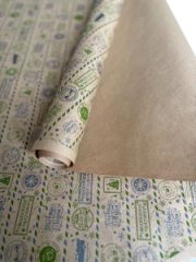 Упаковочная бумага Новогодние марки зеленый/графит на коричневом фоне 720мм/60гр/10м ± 5%