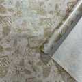Упаковочная новогодняя бумага Цветы золото на коричневом 68см/40пл/10м