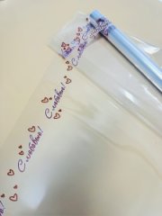 Пленка прозрачная с надписью С Любовью! 70см*400гр ± 5%