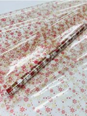 Пленка прозрачная трехцветная НГ Снегопад красный/золотой/белый 68см*200гр ± 5%