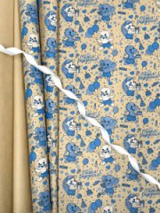 Крафт бумага Детский карнавал голубой на коричневом фоне 680мм/60гр/10м± 5%