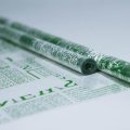 Пленка прозрачная двухцветная с рисунком Газета бело-салатовая 70см*10ярд ± 5%